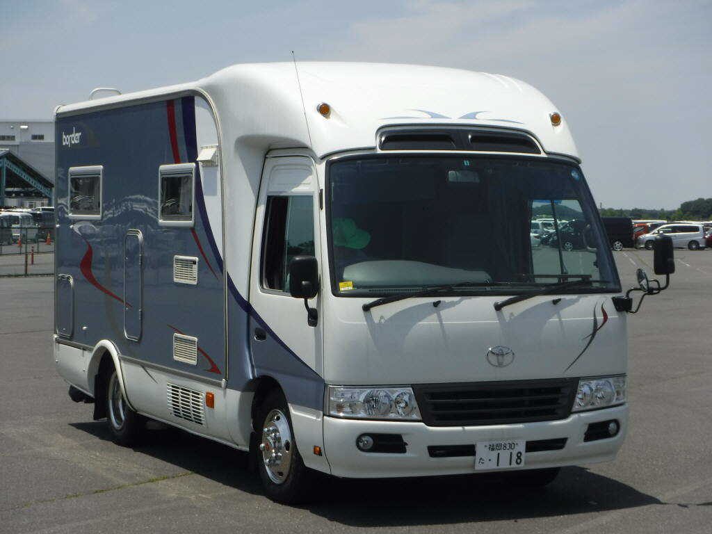 2010 Toyota Coaster LX Camping at auction in Japan (front)