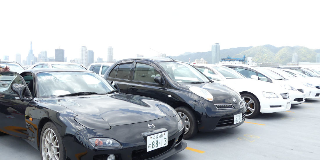 Cars on roof of Japanese car auction HAA Kobe parking lot